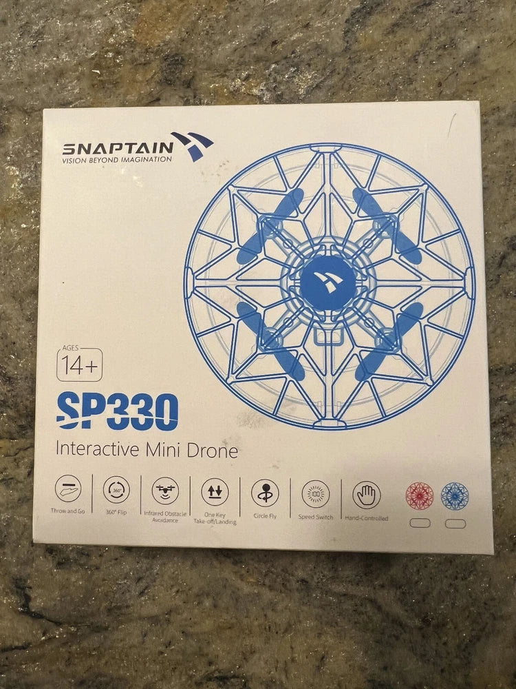 Blue SNAPTAIN SP330 interactive mini drone box, 14+ starter packaging