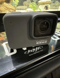 GoPro waterproof action camera front view with square lens housing