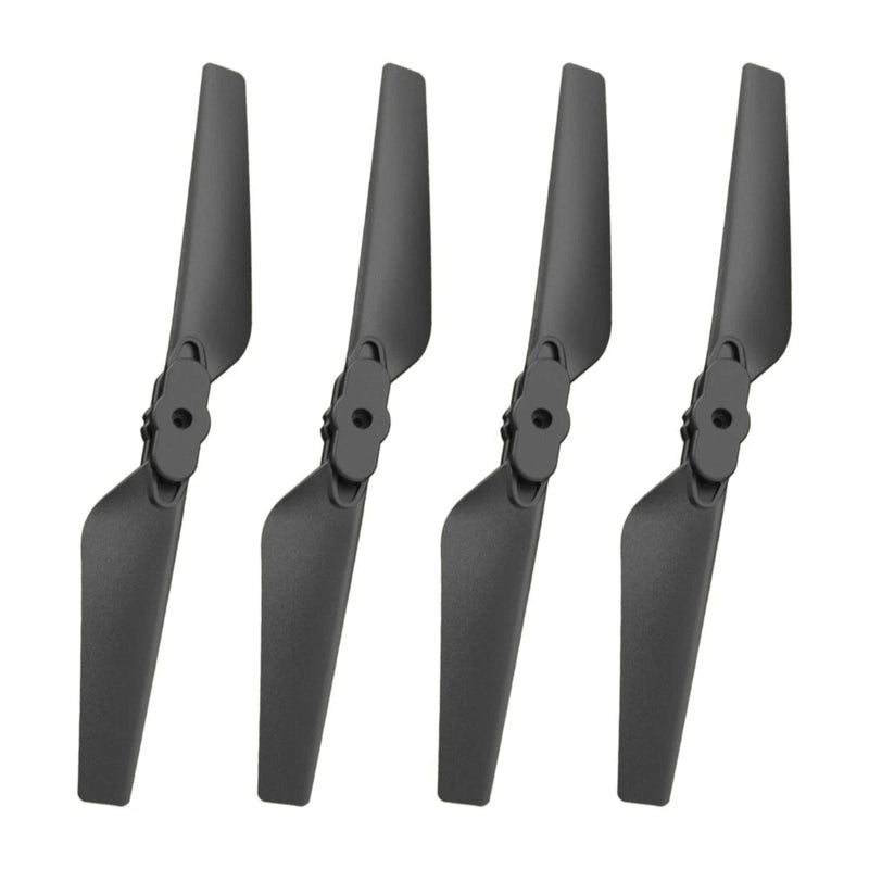 Four black drone propellers with mounting hubs