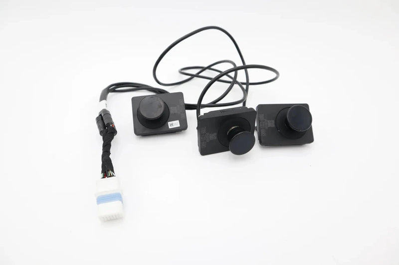 Load sensor module with black control boxes and attached wiring harnesses