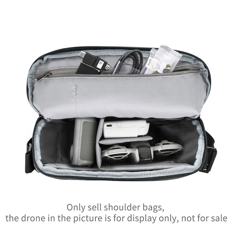 Gray drone storage crossbody bag with zipper, open interior compartments