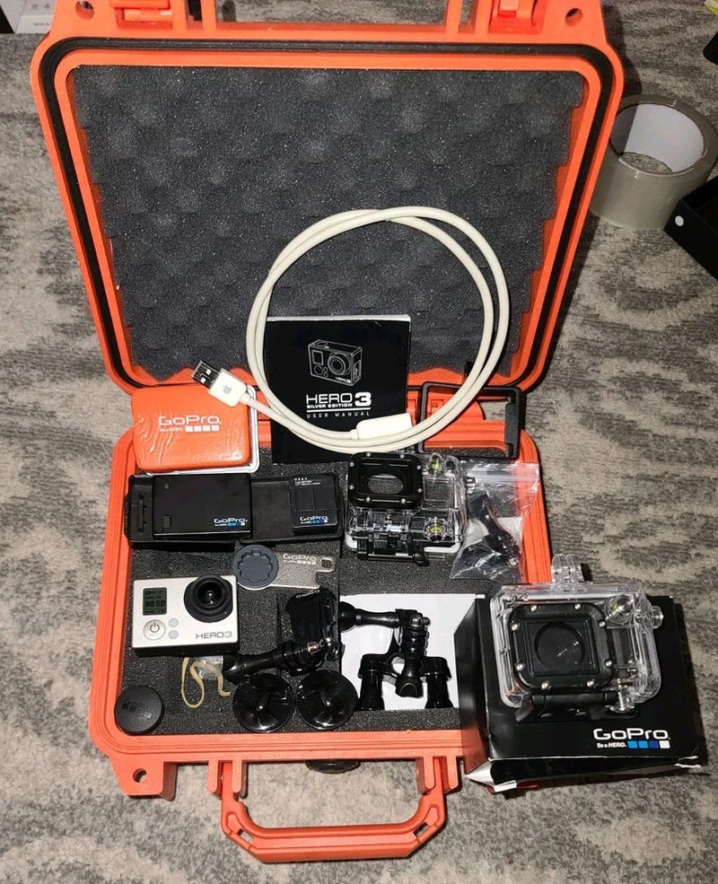 GoPro Hero3 action camera kit in orange Pelican case with accessories and housings