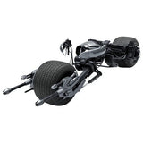 Black futuristic Batpod model vehicle with large textured wheels and exposed mechanical frame