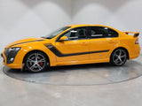 Orange car side stripe decals with black and light accents along the doors