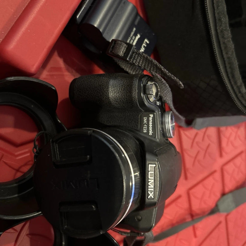 Lumix Panasonic DMC-FZ28 Digital Camera W/2 Batteries Charger And bag 2 hoods