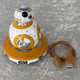 BB-8 droid with orange-and-white body, plus two charging cables with USB connectors