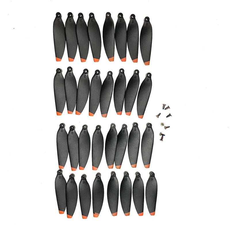 Drone propeller blade set with black blades and orange tips, plus mounting screws