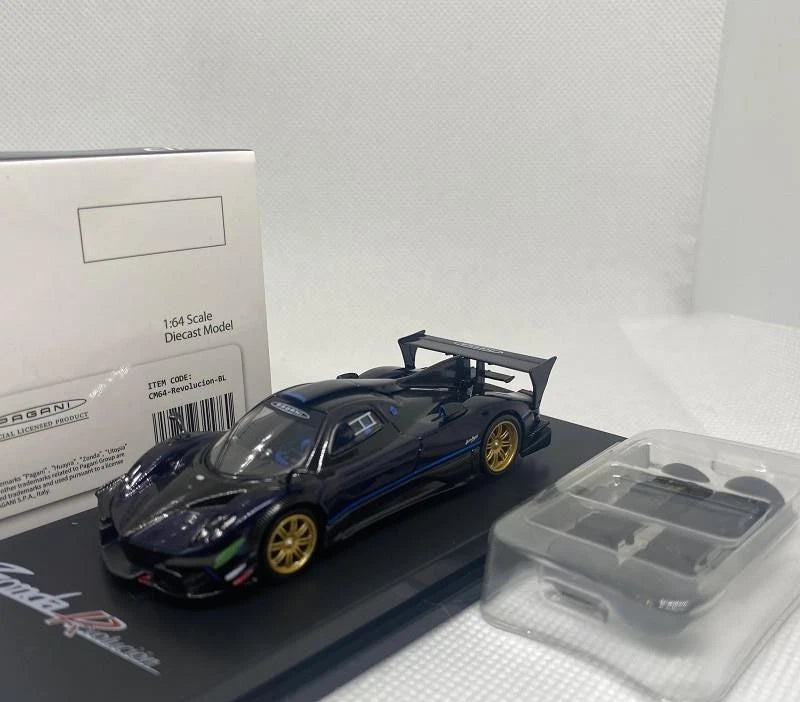 Metallic blue Pagani Zonda Revolucion die-cast model with rear wing and gold wheels