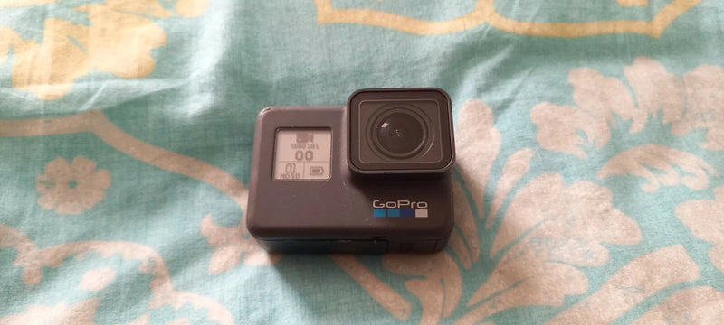 GoPro HERO6 Black waterproof action camera with front lens and rear display