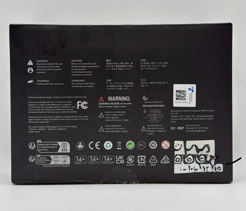 GPS drone packaging box back with warning icons, QR code, and compliance labels