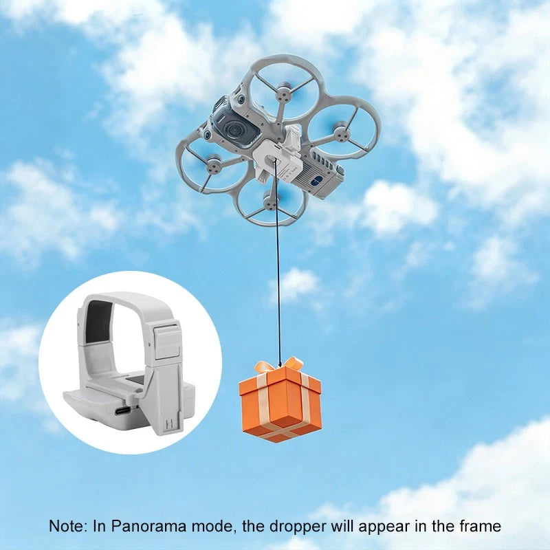 Ground-magnetic drone airdrop device with dropper and orange gift box illustration