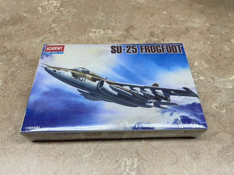 Model aircraft kit box featuring SU-25 Frogfoot artwork, Academy logo