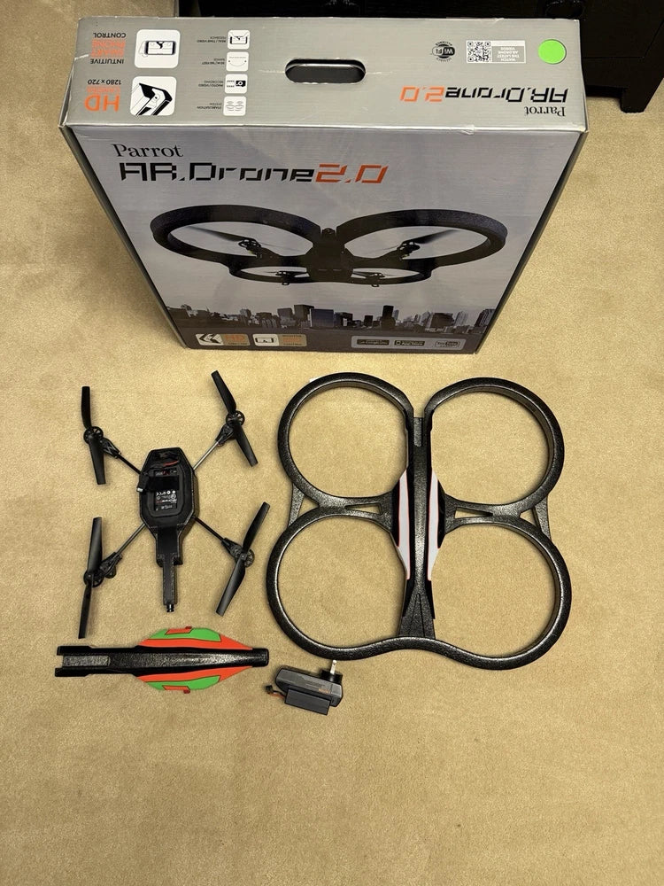 Parrot AR.Drone 2.0 quadcopter drone kit with camera, propellers, and charger