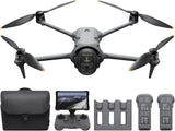 Quadcopter drone with camera, propellers, plus controller, case, and battery modules
