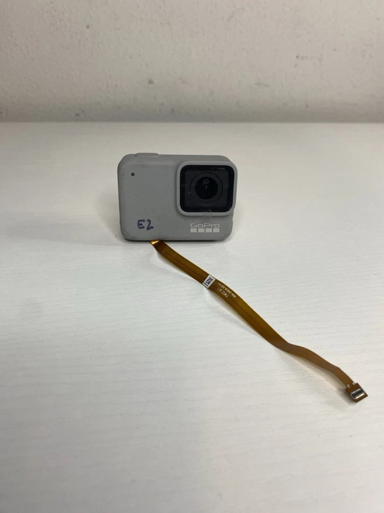 GoPro action camera housing with exposed ribbon cable, for parts