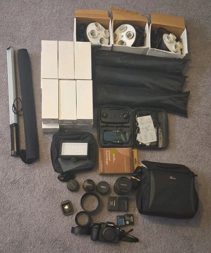 Panasonic LUMIX G7 16 MP Mirrorless, 85mm ,14mm, 25mm, 14-42mm Lenses, 5Lights