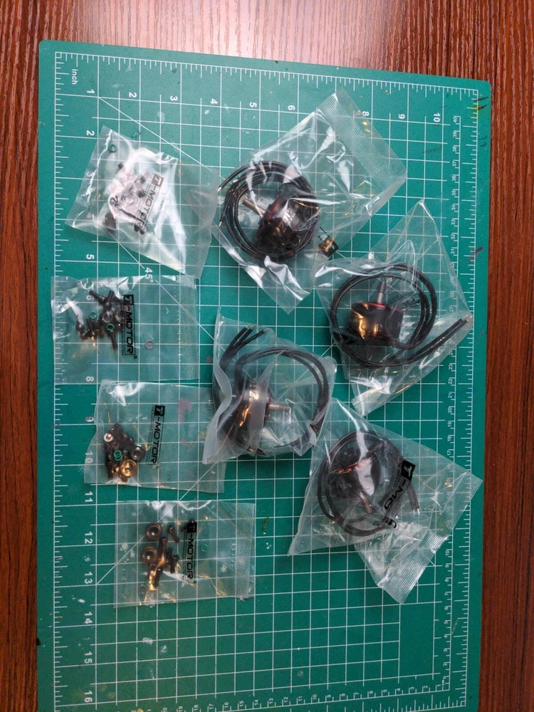 Set of four TMotor Velox 2812 1155KV brushless motors, each in clear storage bag