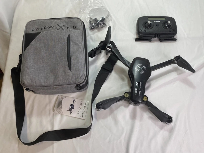 Quadcopter drone parts set with gray zip pouch, controller, and four-blade drone