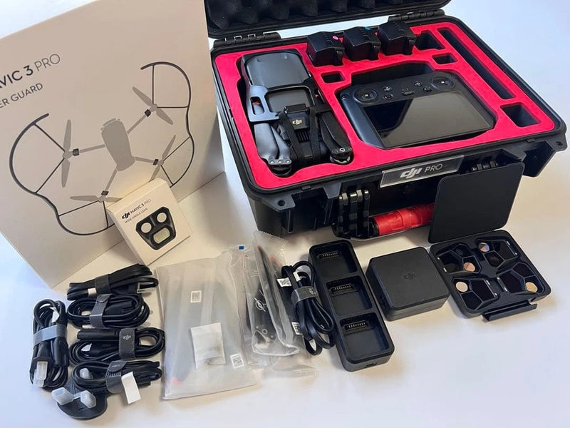 Drone hard case with molded compartments, small accessories, cables, and batteries