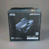 Black foldable quadcopter drone with camera retail box, obstacle avoidance