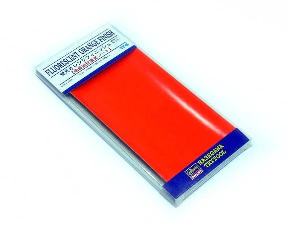 Fluorescent orange model aircraft finish sheet in blue-bordered package