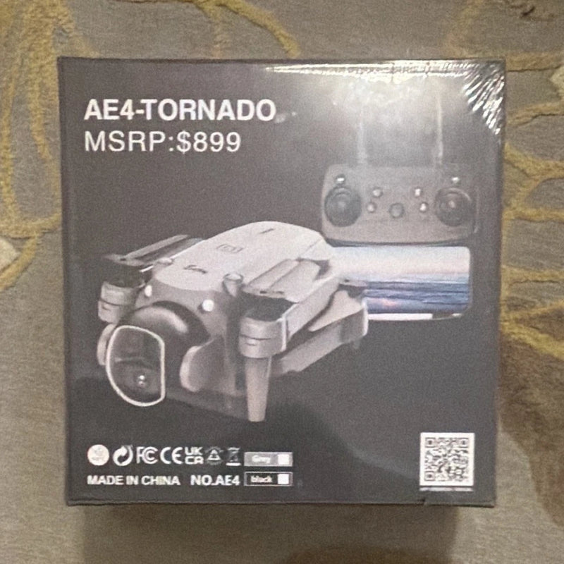 Ready-to-fly drone retail box with controller and camera graphics