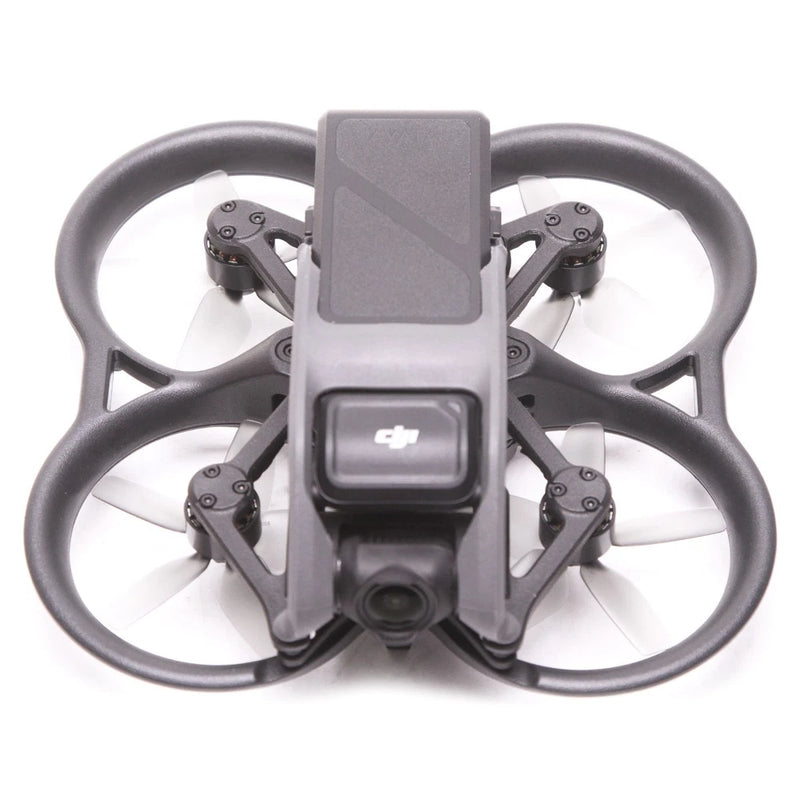 DJI Avata drone with four propellers and front camera sensor, gray body