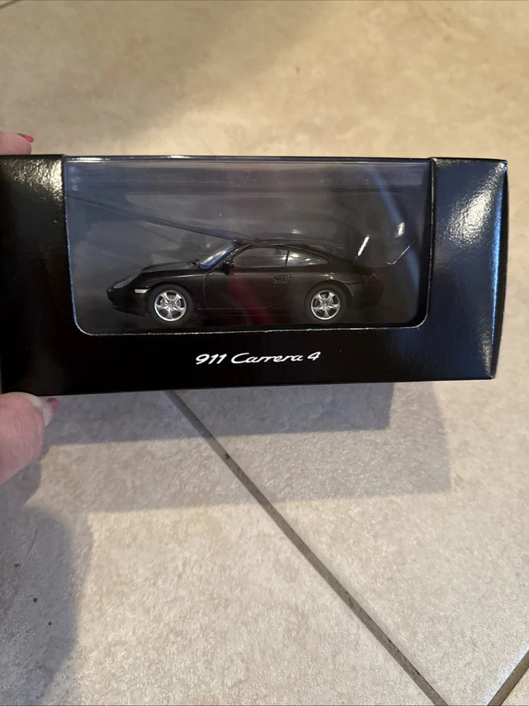 Porsche 911 Carrera 4 1:43 model car in box, black with red interior
