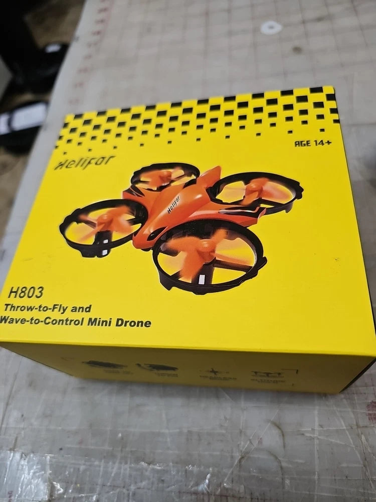 Helifar H803 throw-to-fly mini drone box with illustrated drone and 14+ age label
