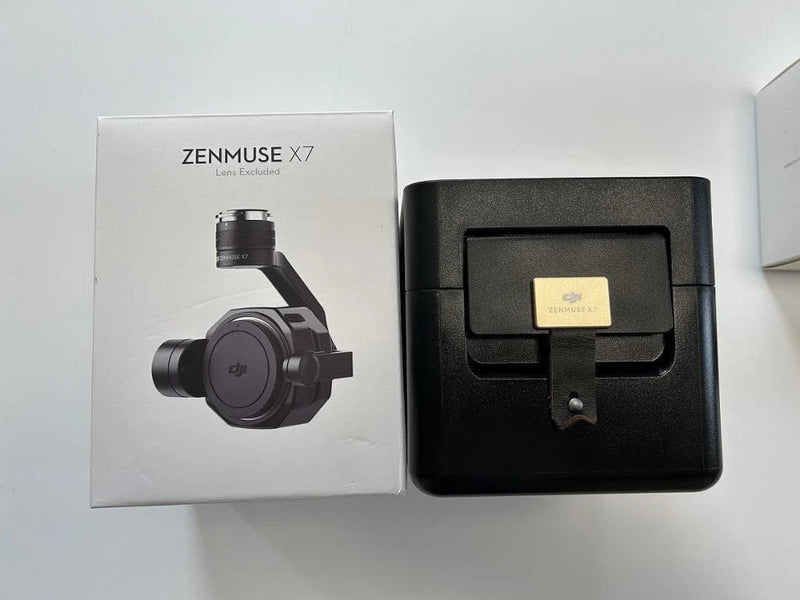 Black Zenmuse X7 camera gimbal unit with mounting base