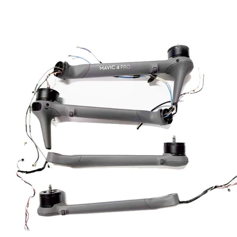Grey quadcopter motor arms with attached wiring and black motor housings