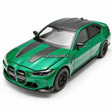 Green diecast model car with black hood stripe and detailed front grille
