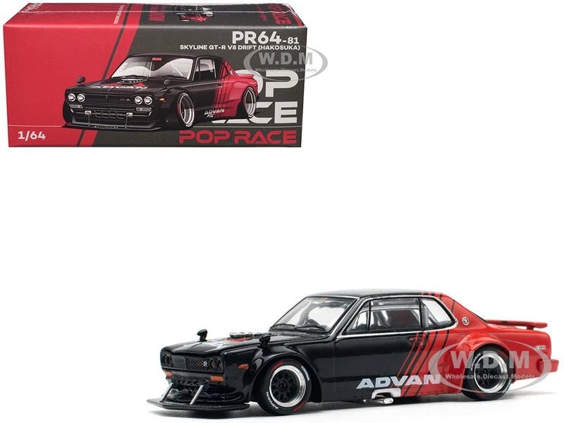Red and black die-cast sports car model with front splitter and headlights