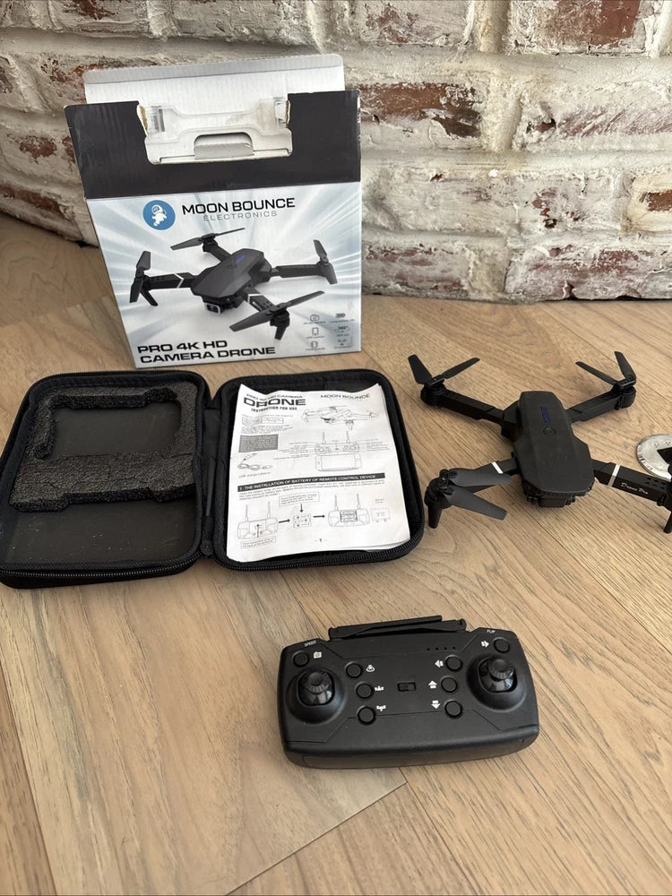 Foldable drone camera kit with controller, spare parts in carrying case