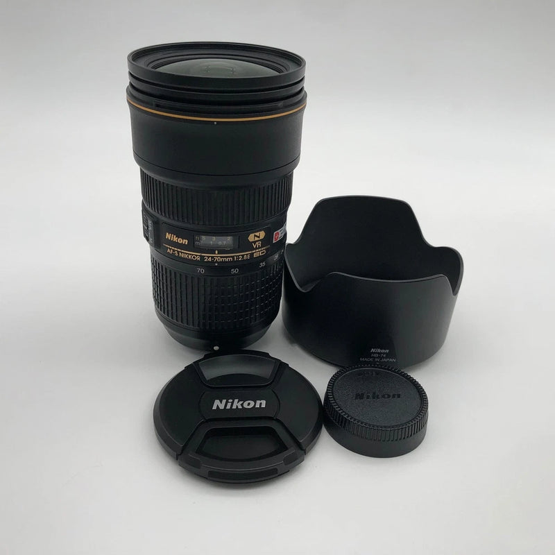 Nikon AF-S 24-70mm f/2.8 lens with hood and front/rear caps