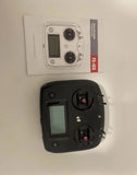 Black RC transmitter controller with LCD screen and dual joysticks