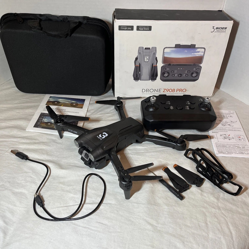 Z908 Pro drone kit with remote controller, cables, manuals, and carrying case