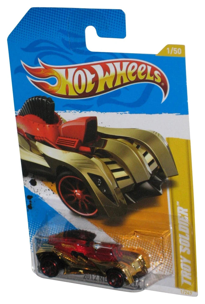 Hot Wheels Troy Soldier 1/50 toy car in red and gold with black details, in blister pack