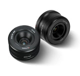 FUJIFILM X-mount 27mm F2.8 autofocus lens, black barrel, front and rear caps shown