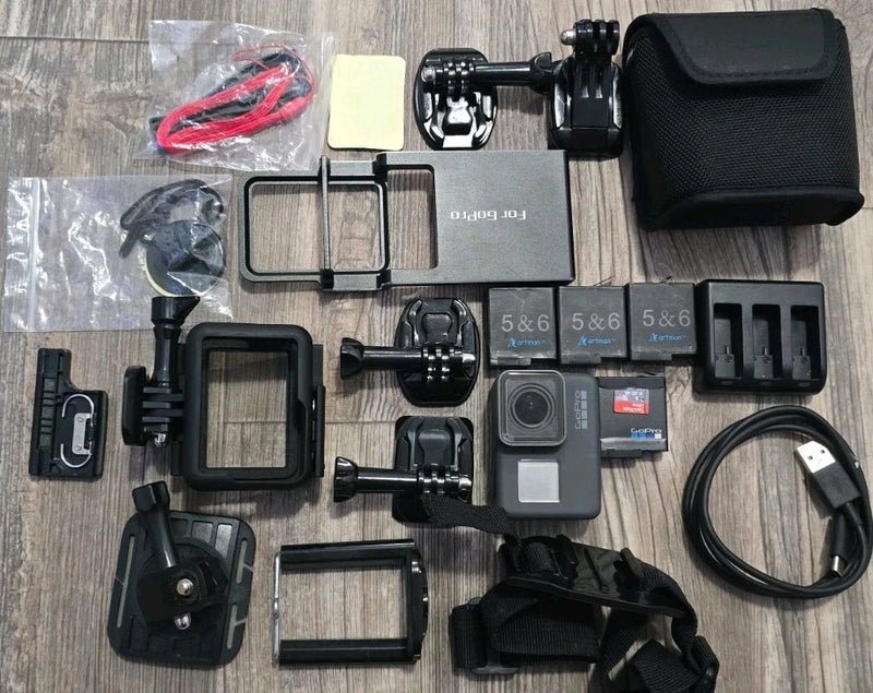 GoPro HERO5 Black action camera kit with mounts, cases, and accessories