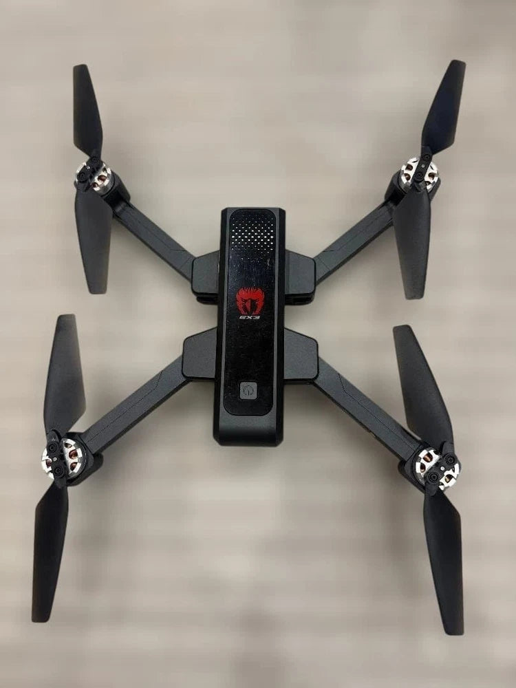 Quadcopter drone with camera, four propellers and foldable arms