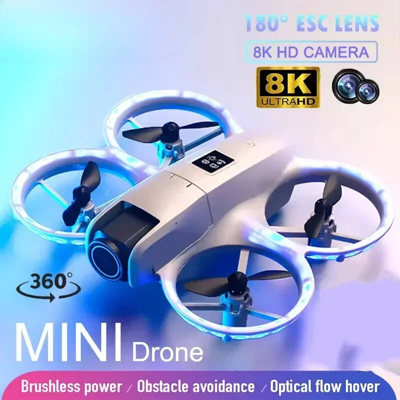 Mini foldable quadcopter drone with LED ring lights and four propellers