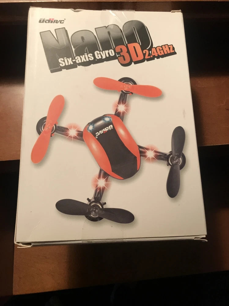 Six-axis gyro 3D 2.4GHz quadcopter drone box with propellers illustration