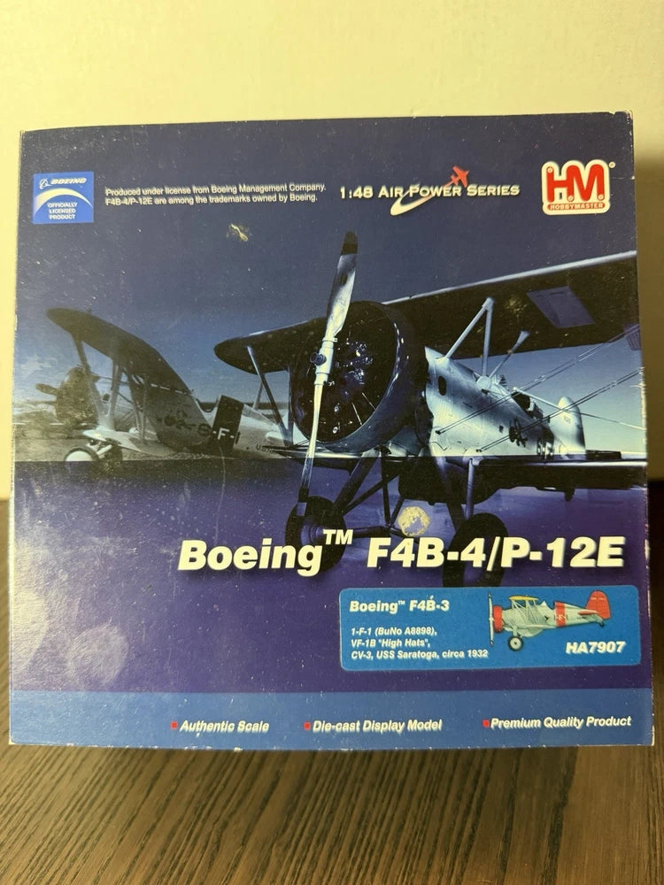 Die-cast Boeing F4B-4/P-12E model airplane in display box, blue-gray