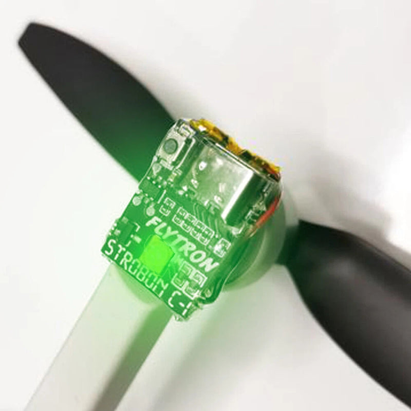 Green Flytron rechargeable LED module with circuit board and black blades