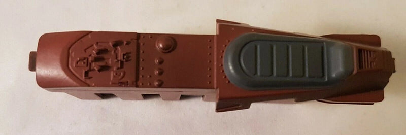 Brown plastic RC battery pack with molded grip and control-style details