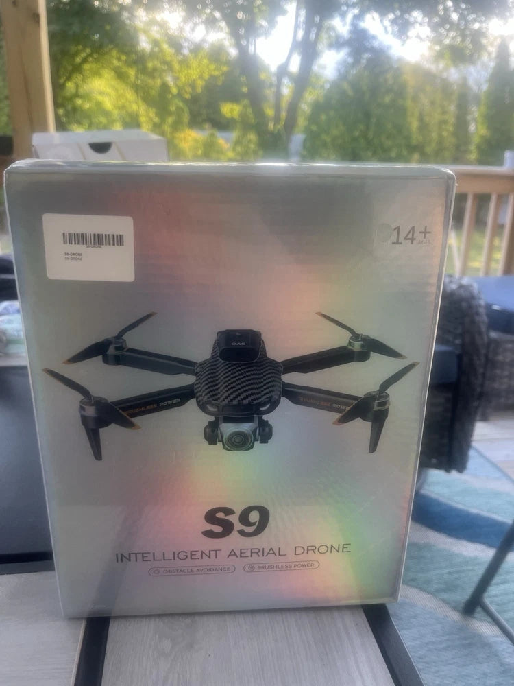 S9 intelligent aerial drone retail box with quadcopter illustration and 14+ label
