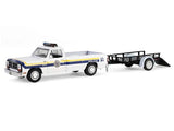 1:64 scale PA police pickup model with attached trailer, white with blue and yellow stripes