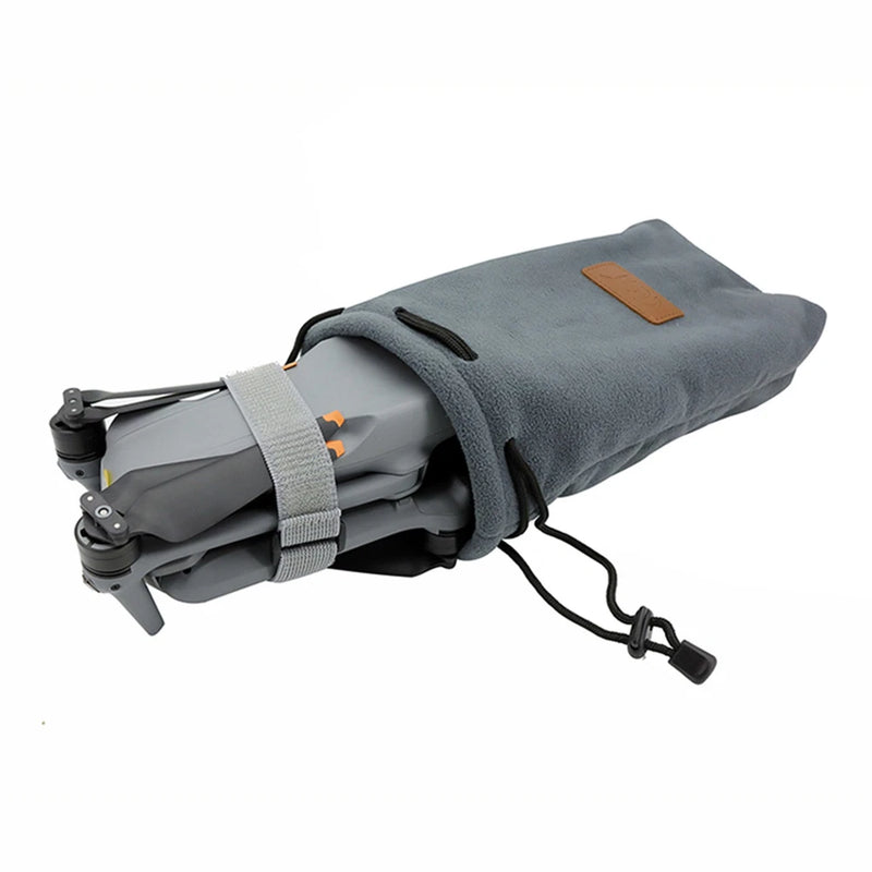 Gray elastic drone harness tie with adjustable strap and cord