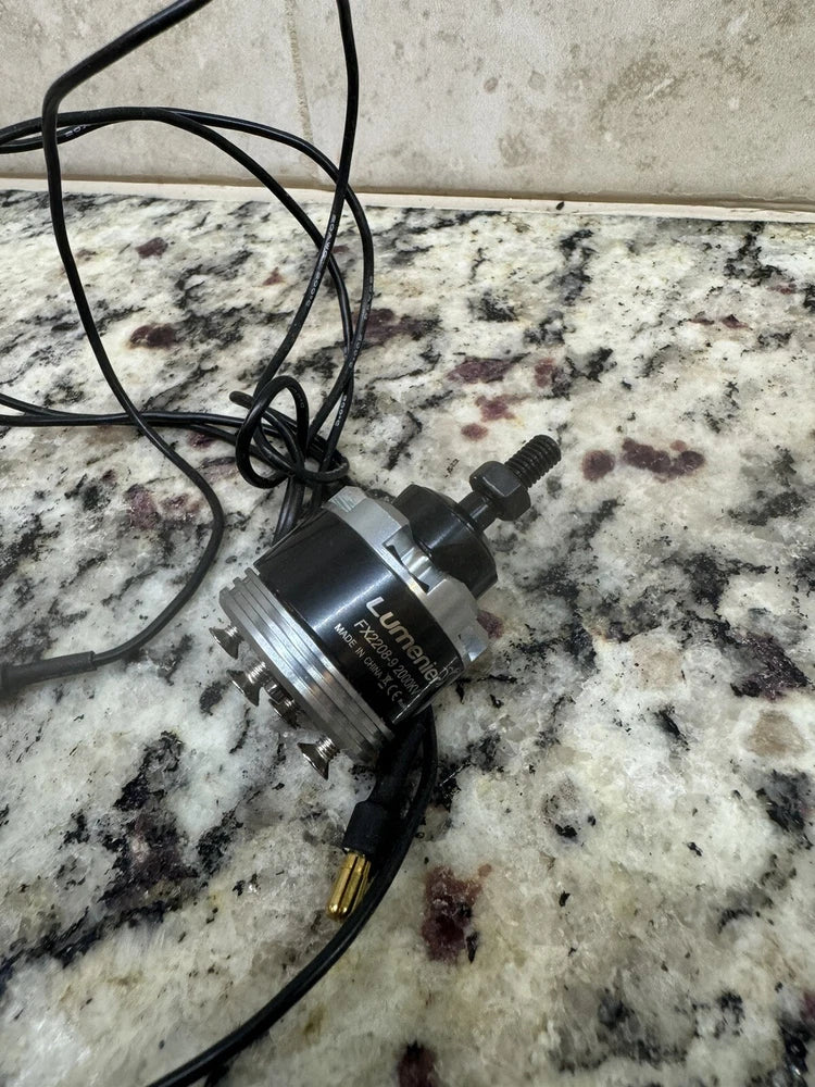 Lumenier brushless RC motor with 2000KV stator and mounting hardware, wired connector